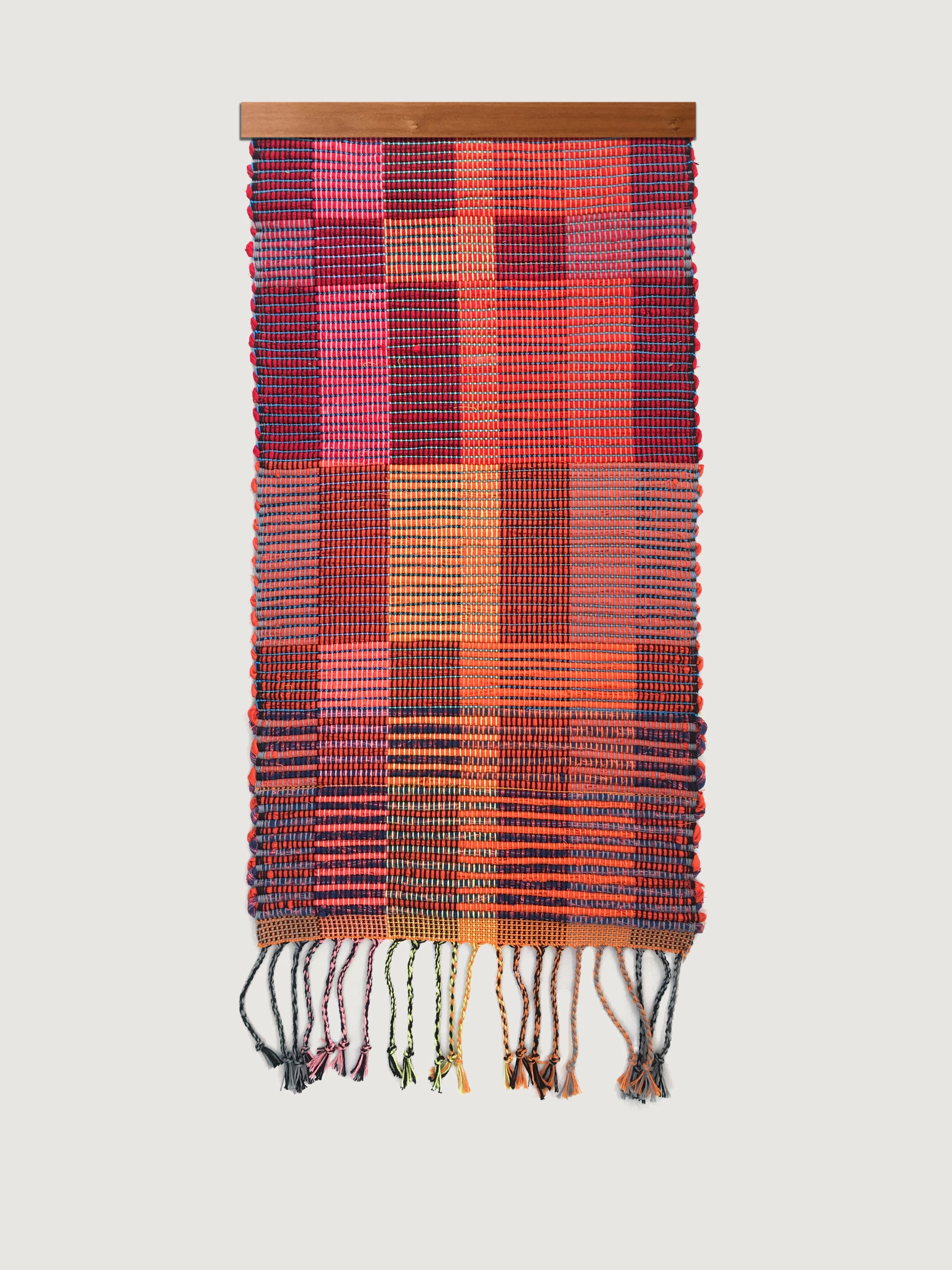Red handwoven wall hanging modern